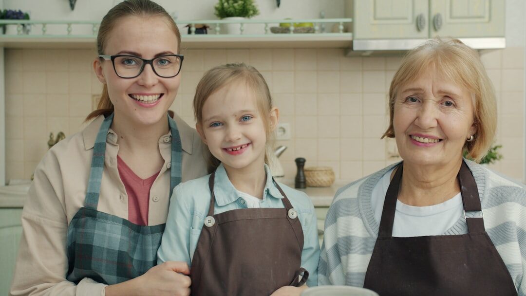 Seniors cooking together in a community kitchen workshop