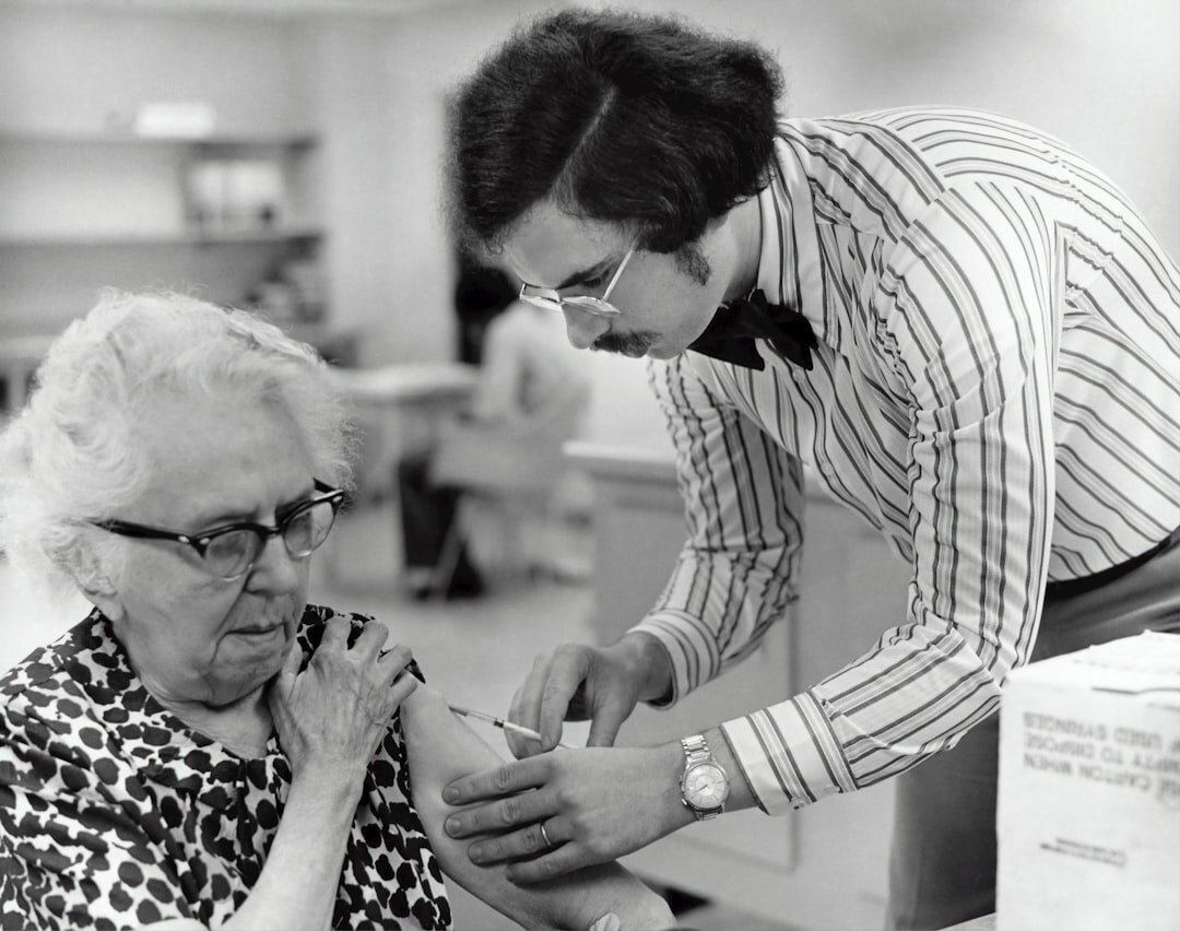 elderly patient with doctor