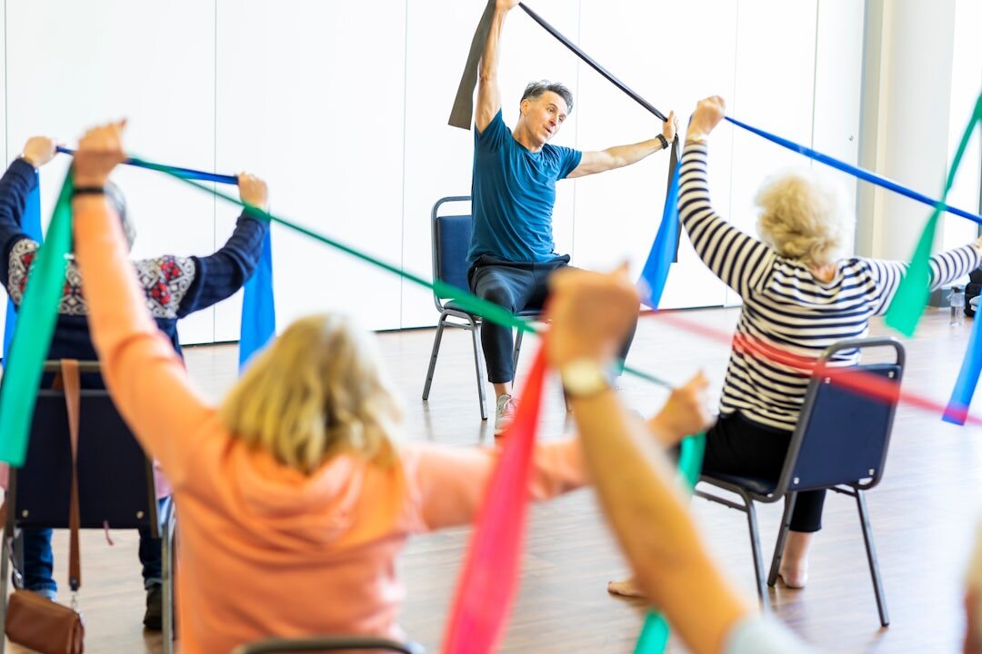 group of seniors doing tai chi
